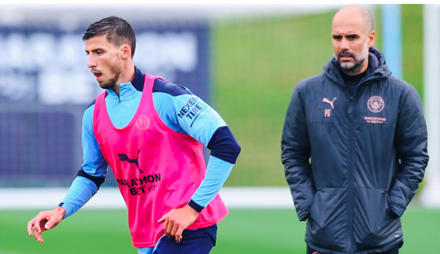 ẢNH: Pep Guardiola “kèm chặt” Ruben Dias trong buổi tập đầu tiên